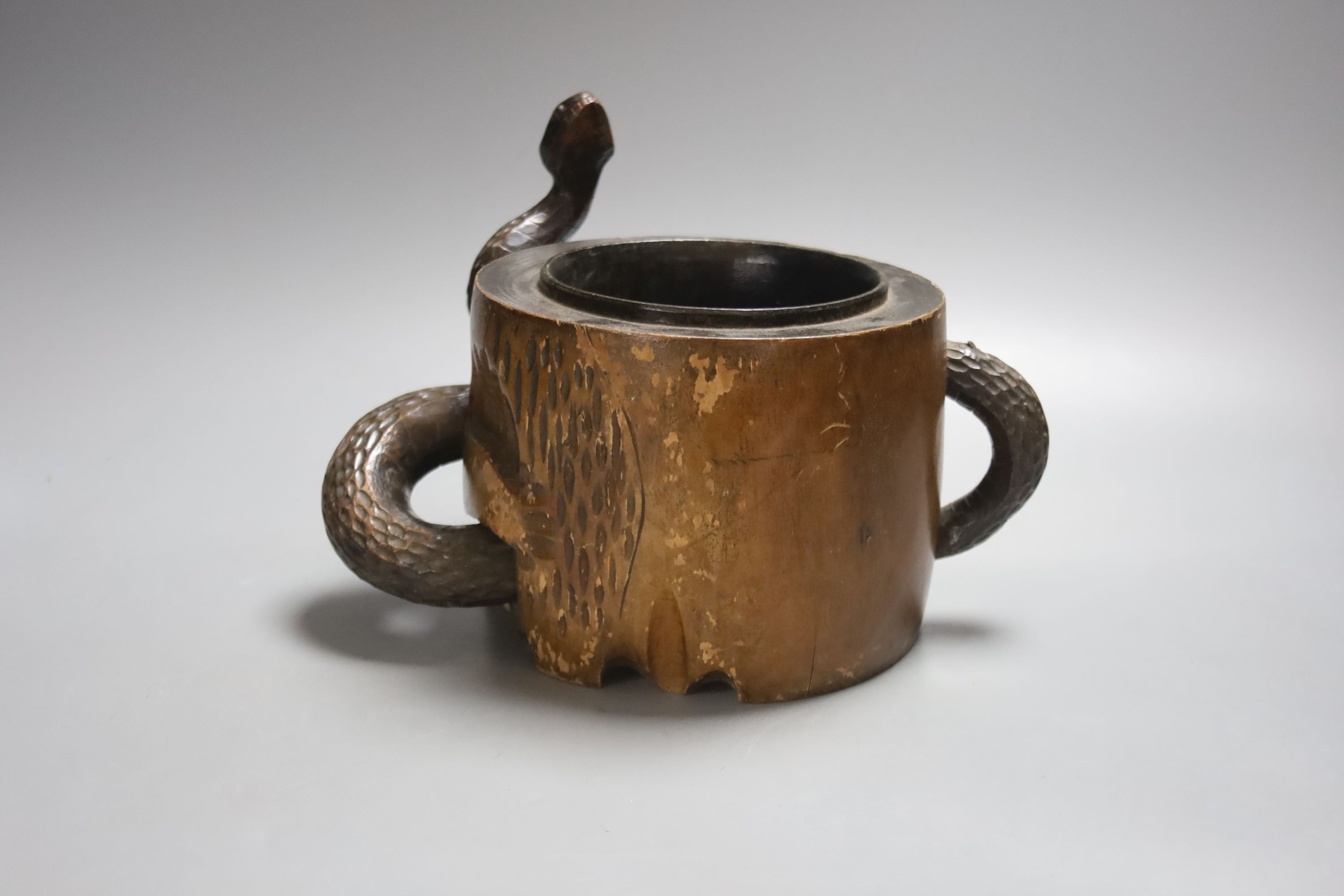 A Japanese wooden skull 'jar', late 19th / early 20th century, 26cm., lacking cover